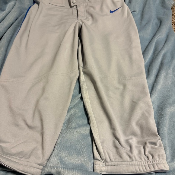 Nike men’s new with tag knicker baseball pants. Gray with royal blue piping - Picture 2 of 3
